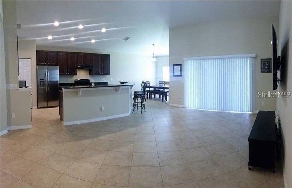 Photo of 10525 Cabbage Tree Loop, Orlando, FL 32825 (MLS # O6401592)