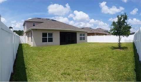 Photo of 10525 Cabbage Tree Loop, Orlando, FL 32825 (MLS # O6401592)