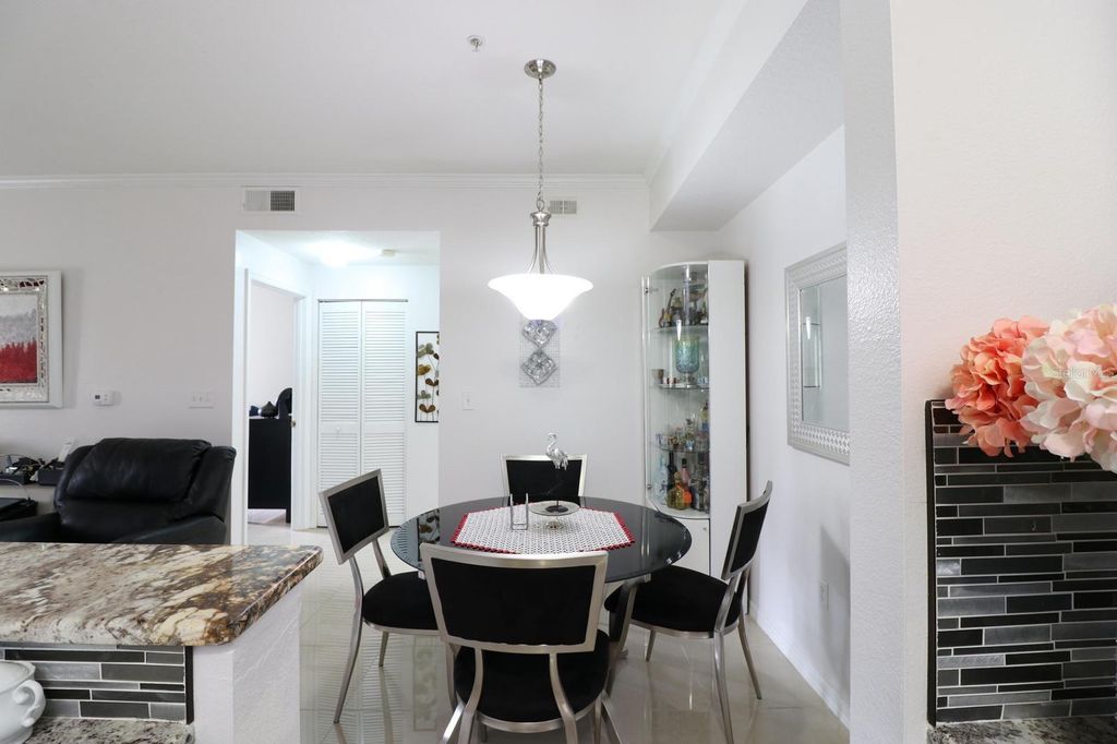 Photo of 5610 Pinnacle Heights Circle #107, Tampa, FL 33624 (MLS # TB8497750)