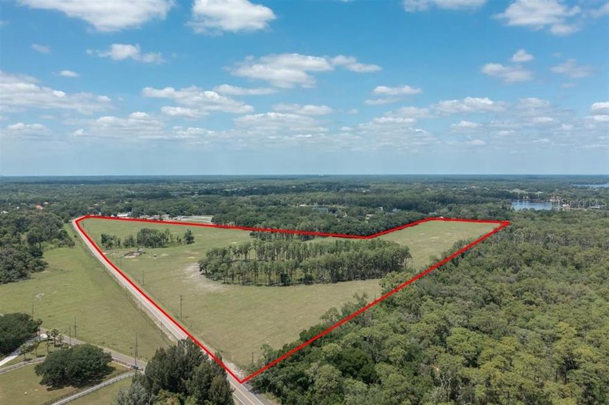 See Virtual Tour!!! Truly a "one of a kind" exceptional, property with prime location in the heart of Odessa. Beautiful pasture with pockets of woods interspersed for extra beauty and privacy. This picturesque estate parcel borders a very nice residential development on one side and several hundred acres of beautifully wooded property (Cosme Odessa Wellfield) on the other side. Very private country atmosphere with shopping at Publix and the Citrus Park Mall just a few minutes away. One of the few large acreage parcels remaining in the Odessa area. All of the subject property, approximately 49.9 acres, is on the North side of Boy Scout Road. Please do not go to the subject property without the listing agent. There is a cattle lease on the subject property therefore extra caution is required. The cattle pens do not convey. VIRTUAL TOUR https://grep.tours/Boy-Scout-Rd/idx