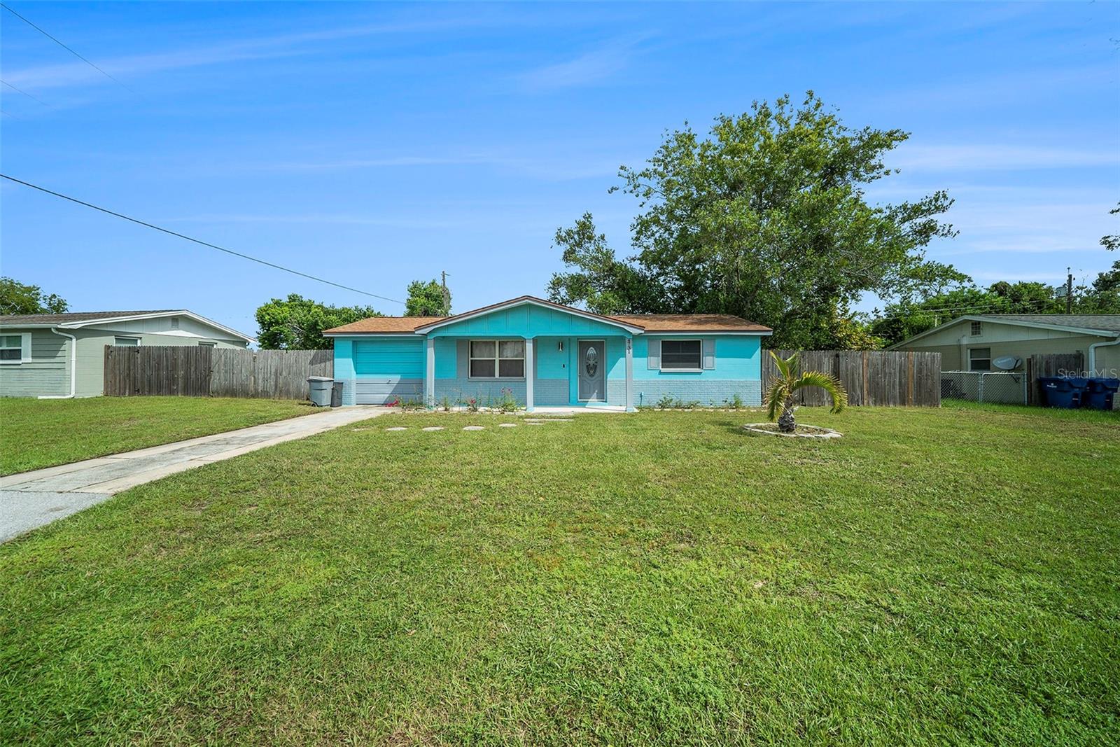 One or more photo(s) has been virtually staged. Welcome to this charming Holiday home featuring fresh new interior paint and a host of recent updates! The AC was replaced in 2019, the roof is in great condition, and a new water heater was installed in 2023, giving buyers peace of mind for years to come. The kitchen shines with newer stainless steel appliances, making it perfect for everyday living and entertaining. This move-in ready property combines comfort and reliability in a convenient location close to shopping, dining, and Florida’s beautiful Gulf beaches. Don’t miss the opportunity to make this well-maintained home yours!