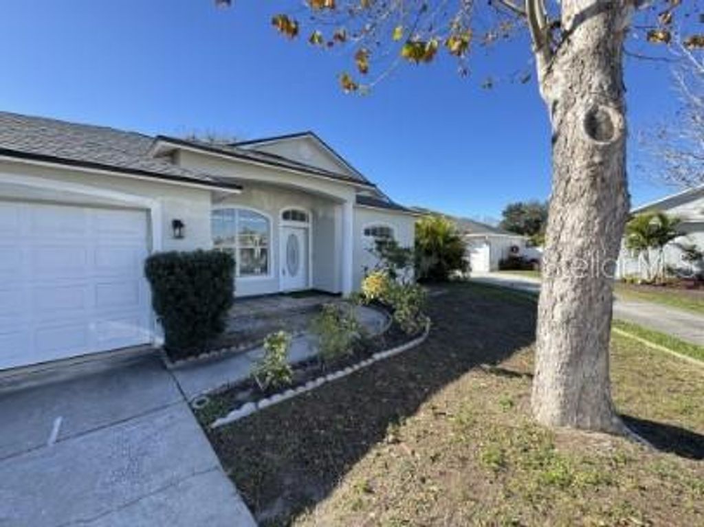 Photo of 1839 Sunrise Dunes Court, Tarpon Springs, FL 34689 (MLS # TB8465696)