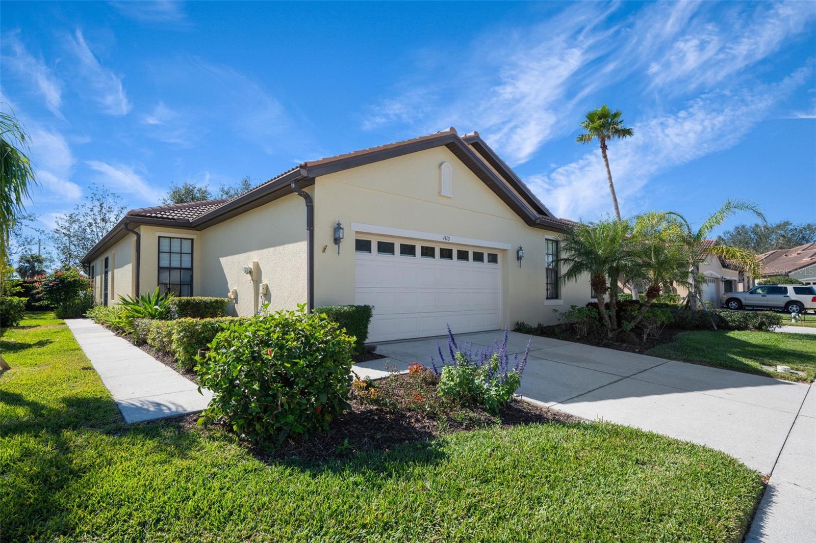 Rarely Available Michelangelo Model in Venetian Falls – A True Florida Gem. Welcome to the sought-after Michelangelo model by Centex Homes, located in the vibrant 55+ community of Venetian Falls. Designed with the Florida lifestyle in mind, this beautifully updated villa blends comfort, style, and functionality. Inside, you’ll find modern finishes throughout—including designer-selected wall colors, custom light fixtures and ceiling fans, crown molding, and remote-controlled blinds. The split-bedroom floor plan offers ideal privacy, with spacious bedrooms on opposite ends of the home. The oversized primary suite is large enough to include a cozy sitting or lounging area. What sets this home apart? Two separate family rooms provide flexible living and entertaining space. The large kitchen features an eat-in dining nook and breakfast bar, combining practicality with modern flair. For more social gatherings, an open dining room space adds to the home's entertaining appeal. Step out onto the extended, screened lanai and relax in your personal garden oasis. Surrounded by lush landscaping, flowering plants, and mature oaks, it’s the perfect place to enjoy Florida’s natural beauty—and there's plenty of space to indulge your green thumb. Venetian Falls offers an array of resort-style amenities, including a heated lap pool and spa, resistance walking pool, state-of-the-art fitness center, billiards room, bocce courts, and a full-time activities director. Located just minutes from the Gulf Coast beaches and charming downtown Venice, you'll enjoy the best of coastal living. Experience relaxed, elegant living in one of Venice’s most desirable communities—schedule your showing today!