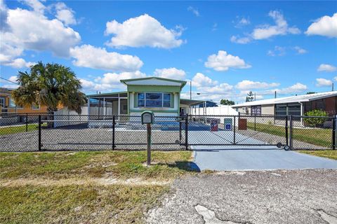 Photo of 1841 Holiday Drive, Holiday, FL 34691 (MLS # W7880046)