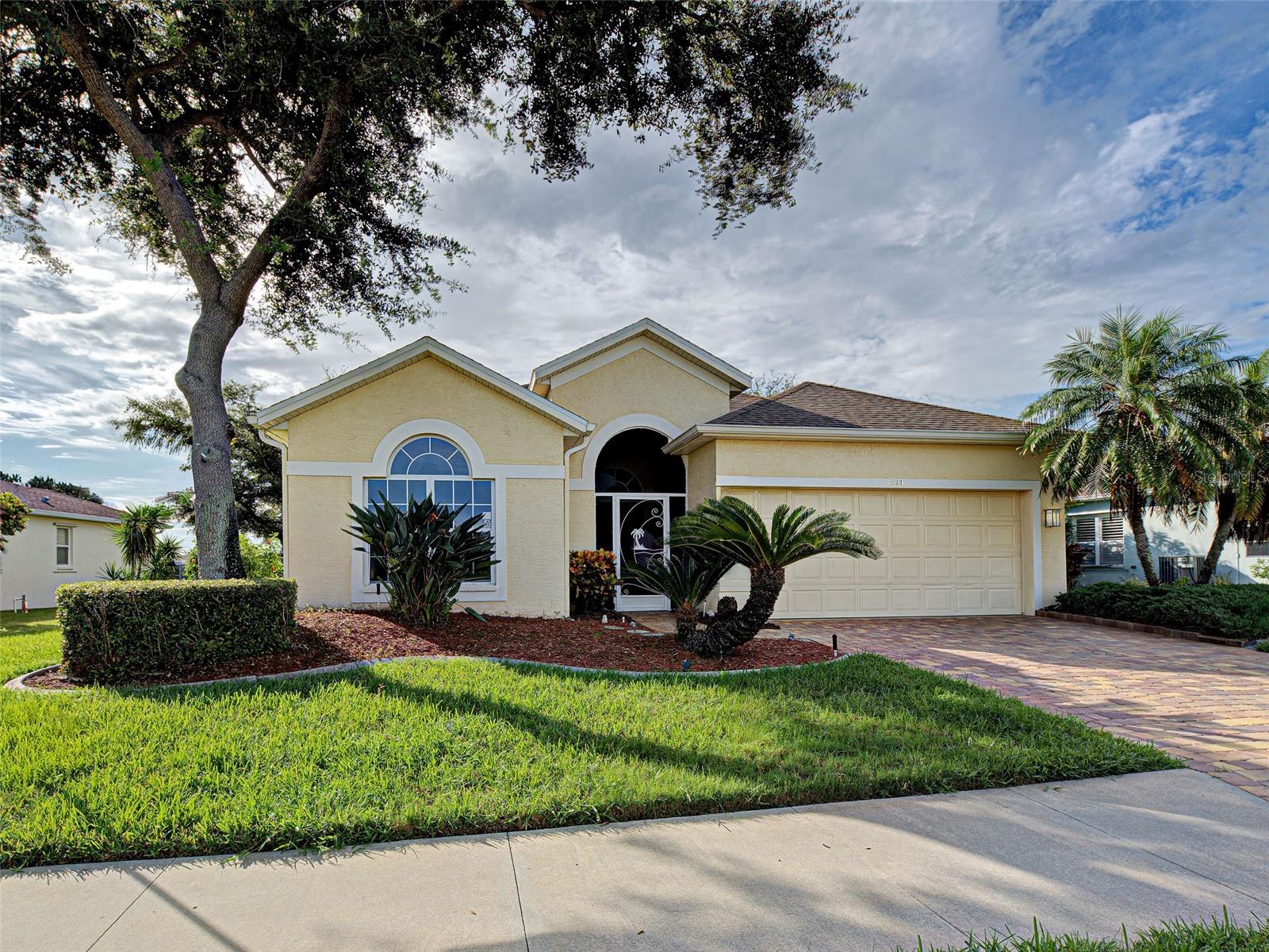 Welcome to this spacious 3-bedroom, 2-bath pool home located in the highly desirable community of Woodmere Lakes in Venice, Florida. This home features tile floors in the main living spaces, a split floor plan, eat in kitchen with a bay window, mature landscaping, pavers in the driveway and the roof was replaced in 2019. There is an office/flex space with double doors too! NO CDD FEES and the LOW HOA fees are only $860 ANNUALLY. This well-maintained home offers plenty of room to entertain, with a refreshing pool that makes every day feel like a vacation. Relax on the pool deck enjoying the view of the natural preserve and to the left you can see the pond with plenty of landscaping that creates privacy. Fantastic location close to shopping, dining, entertainment, Wellen Park, historic downtown Venice and of course our world famous beaches! Don’t miss your chance to own a piece of paradise—schedule your showing today!