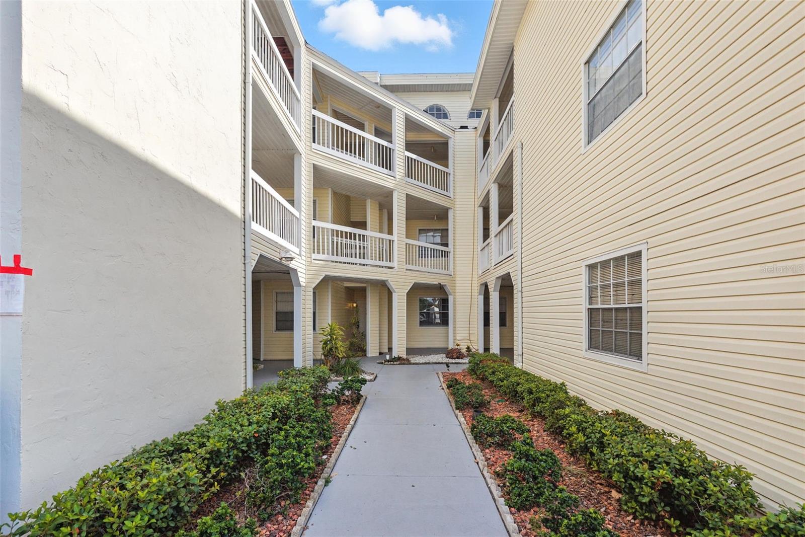 This light-filled 2 bedroom, 1.5 bathroom condo is nestled in the sought-after Stones Throw Condominium community—right in the heart of sunny St. Petersburg, Florida. Whether you're looking for a smart investment, a low-maintenance home, or the perfect beachside getaway, this well-cared-for unit offers the ideal combination of comfort, convenience, and coastal lifestyle. Step inside to a spacious living and dining room combo with luxury vinyl planking throughout the main areas, making everyday living and cleanup a breeze. The primary bedroom features warm laminate wood flooring and a generous closet, while large windows and ceiling fans throughout the home invite in an abundance of natural light and Florida’s signature breezes. Washer and dryer are included for your convenience. Enjoy the ease of low-maintenance living with a condo fee that covers cable TV, internet, water, sewer, trash, and exterior upkeep. The community amenities are a bonus, with tennis courts, a sparkling pool, and lush landscaping creating a peaceful, resort-style atmosphere. Ideally located just steps from Crosswinds Shopping Center, you’ll be moments away from a wide selection of shops, restaurants, grocery stores, and essential services. Commuters will love the quick access to major highways, local hospitals, and downtown St. Petersburg, while beach lovers can take a short drive to some of the Gulf Coast’s most beautiful beaches. Don't miss your opportunity to own a slice of paradise in one of St. Pete’s most convenient and charming communities. Schedule your private tour today!