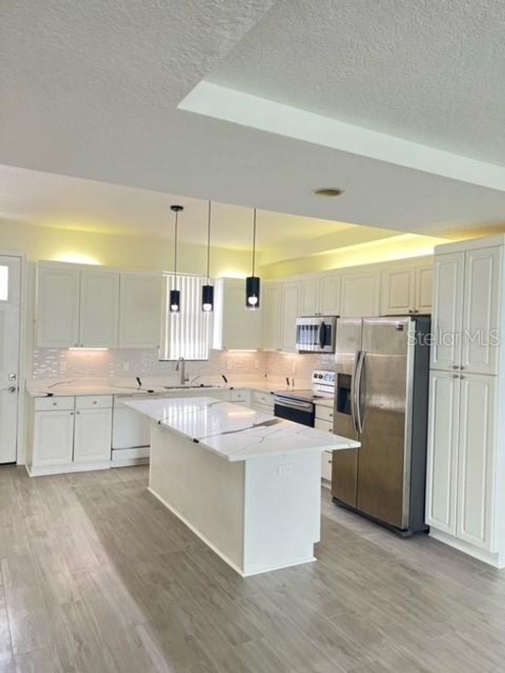 Photo of 655 Cornerstone Drive, Kissimmee, FL 34744 (MLS # O6409919)