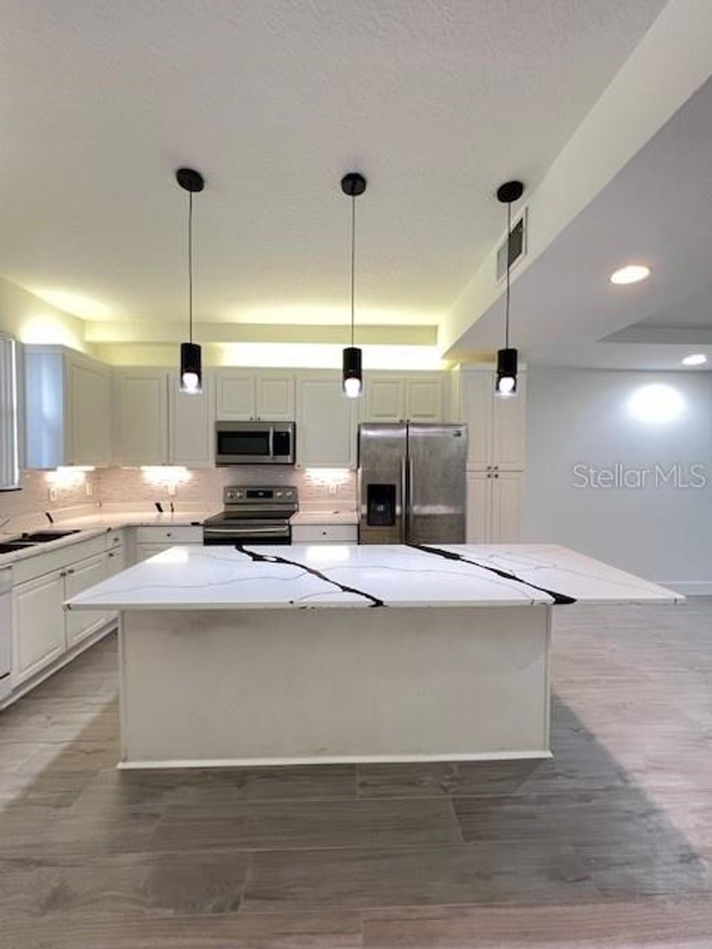 Photo of 655 Cornerstone Drive, Kissimmee, FL 34744 (MLS # O6409919)