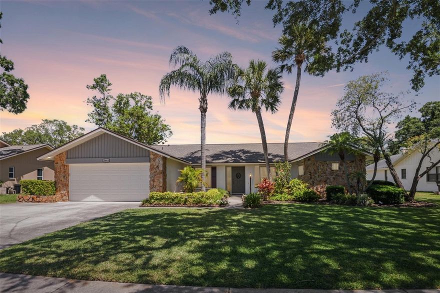 Welcome to 3463 Northridge Dr, a stunning 4-bedroom, 3-bathroom pool home offering the perfect blend of privacy and modern efficiency. Backing up to Country Hollow Park, you’ll enjoy the peace of having no rear neighbors while being just minutes from Countryside Country Club, premier shopping, dining, and world-class Gulf beaches. The interior features soaring vaulted ceilings and a flexible floor plan with multiple living spaces, all tied together by a spacious kitchen boasting granite countertops, stainless steel appliances, and a breakfast bar. With a smart split-bedroom layout and absolutely no carpet (LVP and tile throughout), the home feels both expansive and easy to maintain. The primary suite serves as a true retreat with dual closets, an ensuite, and sliding door access to the screened lanai.

This home has been meticulously updated for total peace of mind, featuring a new roof, solar system, A/C, and pool pump all installed in 2023. Further enhancements in 2025 include fresh Sherwin Williams exterior paint, a new irrigation system, and a whole-home water purification and softening system. Outside, the sparkling pool offers direct access to a full bathroom, while the fenced yard provides a secure space for play or pets. For added protection, the property includes a pool safety fence and custom-fit, easy-to-install hurricane shutters. Move-in ready with a 2-car garage and every major system recently updated—schedule your tour today!