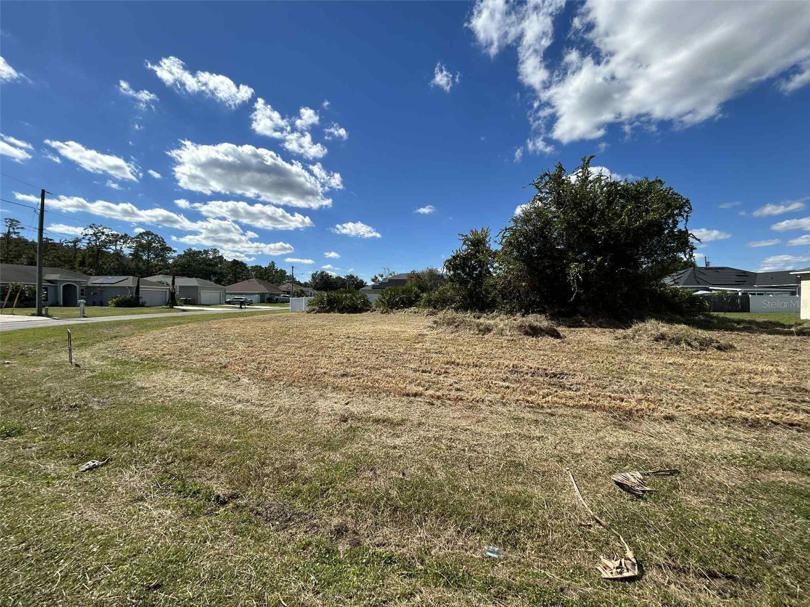 BUILD YOUR DREAM HOME ON THIS OVERSIZED HOMESITE! Discover the perfect opportunity to create your custom home on this residential lot that is slightly larger than 1/4 Acre (0.28).  This site has ample room for a custom home, outdoor living spaces, and even a pool. Public utilities are nearby, and zoning supports single-family residential development.  Poinciana features lots of amenities which include parks, playgrounds, pools, soccer fields, basketball, baseball, softball, tennis, racquet ball, and fitness center. Great proximity to Poinciana Hospital, schools, restaurants, shopping and few minutes drive to Disney, SeaWorld, Universal Studios, Orlando International Airport, and beaches. MAKE AN APPOINTMENT TODAY TO VIEW IT AND SUBMIT YOUR OFFER. BRING YOUR BUILDER AND MAKE YOUR VISION A REALITY. THIS AMAZING HOMESITE WON’T LAST LONG!