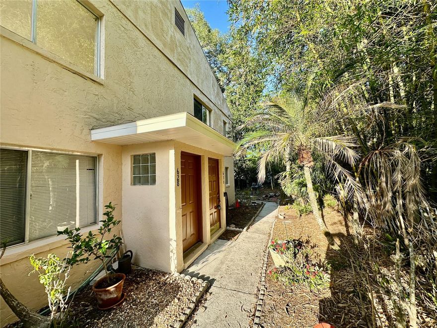 Welcome to 630 Pavare Ct, a charming 2-bedroom, 2-bath end-unit condo available for rent in the desirable Orchid Springs community. This second-floor residence offers 823 square feet of comfortable living space with an open floor plan, ceramic tile flooring throughout, with carpet in the bedrooms and neutral paint tones. The spacious great room flows into the dining area and kitchen, creating a functional layout for everyday living. The kitchen includes a gas range, microwave, refrigerator, garbage disposal, closet pantry, and a stackable washer and dryer.
The primary bedroom features a walk-in closet and private bath with a walk-in shower, while the guest bathroom offers a tub/shower combination. Enjoy relaxing views from the private balcony. An assigned parking space is located near the unit, with additional guest parking available. Conveniently located near shopping, dining, entertainment, medical facilities, and major roadways with easy access to Tampa and Orlando. Call today for your private showing!