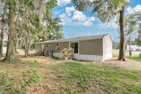 Tiny photo for 1425 NW 83rd Place, Ocala, FL 34475 (MLS # OM715593)