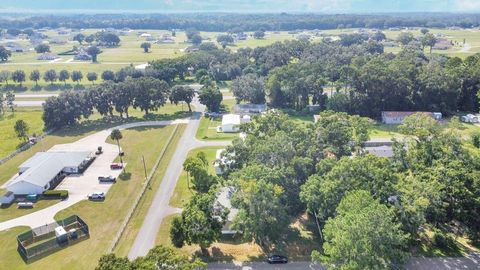 Tiny photo for 1425 NW 83rd Place, Ocala, FL 34475 (MLS # OM715593)