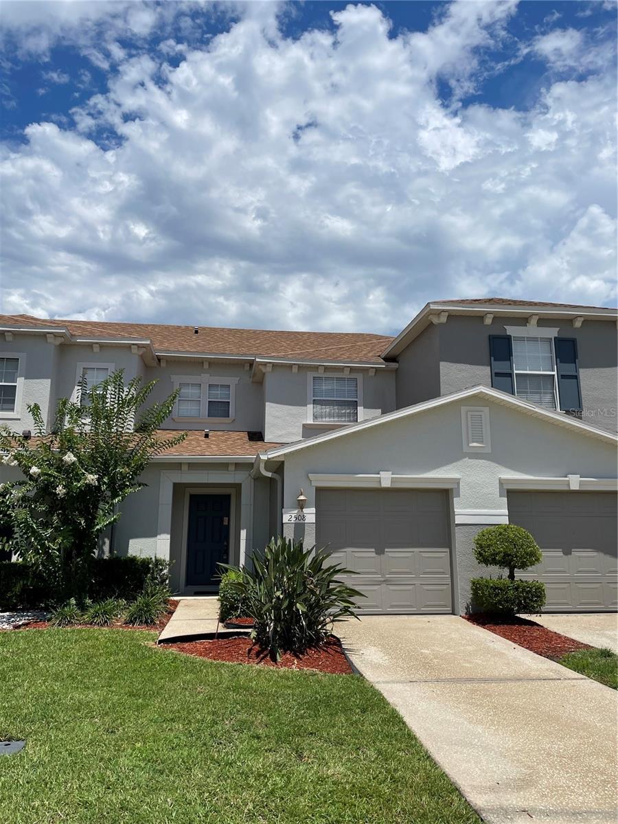 Beautiful townhome in a gated community. Many upgrades such as glass top stove, upgraded tile in kitchen, bathrooms and laundry room, upgraded carpet and padding, rounded drywall corners, upgraded 42" cabinets, large linen closet in 2nd full bath, upgraded "soaker tub" in 2nd full bath, master bath features a garden tub with separate stand up shower with upgraded, recessed lights, upgraded tile in master bath, huge walk in closet in master, oversized closet in bedroom two, plenty of storage space, built in sinks with marble countertops in both full baths, upgraded fixtures, terrific lawn overlooking a community water feature, right beside the pool, many energy saving items such as radiant roof barrier, low flowtoilets, energy star appliances.