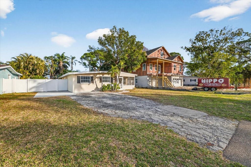 Photo of 9015 Bay Street NE, St Petersburg, FL 33702 (MLS # TB8467894)