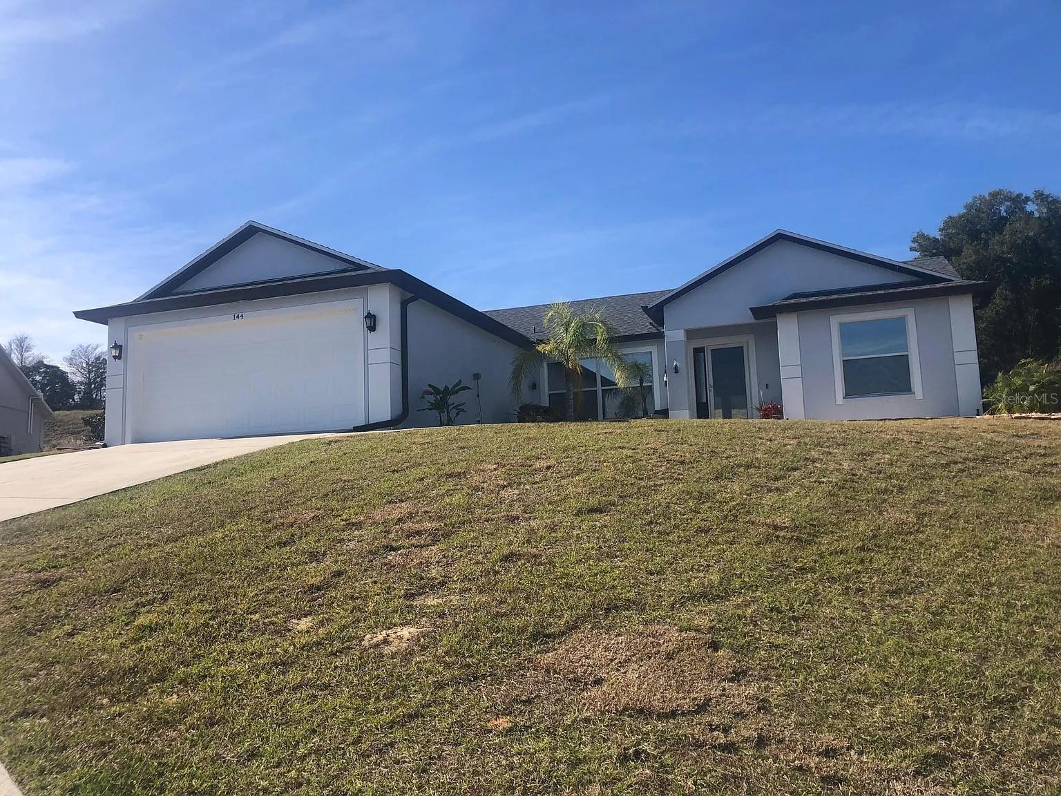 Experience peaceful living in this beautifully maintained 3-bedroom, 2-bath home located on a quiet cul-de-sac in the highly sought-after Quail Valley community of Minneola. Set on an oversized lot with breathtaking elevated views of Grassy Lake, this home features an open-concept layout with a spacious family room, formal dining area, and a large eat-in kitchen perfect for entertaining. The primary suite includes dual closets, one of which is custom-designed for added functionality and style. Nestled in a serene neighborhood known for its friendly, welcoming neighbors, this home offers both tranquility and convenience with close proximity to top-rated schools, shopping, dining, and major highways.
