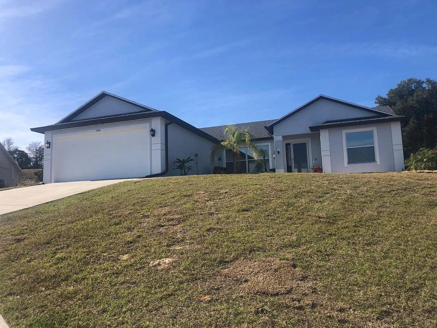 Experience peaceful living in this beautifully maintained 3-bedroom, 2-bath home located on a quiet cul-de-sac in the highly sought-after Quail Valley community of Minneola. Set on an oversized lot with breathtaking elevated views of Grassy Lake, this home features an open-concept layout with a spacious family room, formal dining area, and a large eat-in kitchen perfect for entertaining. The primary suite includes dual closets, one of which is custom-designed for added functionality and style. Nestled in a serene neighborhood known for its friendly, welcoming neighbors, this home offers both tranquility and convenience with close proximity to top-rated schools, shopping, dining, and major highways.