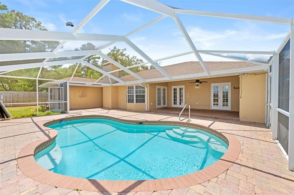 Photo of 3272 Bluestone Avenue, Spring Hill, FL 34609 (MLS # W7885897)