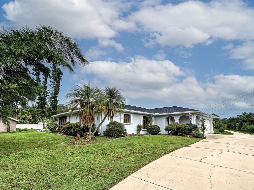 Photo of 1181 Seacrest Drive NW, Port Charlotte, FL 33948 (MLS # N6140445)