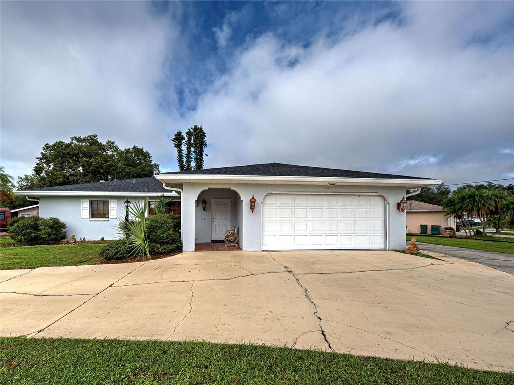 Photo of 1181 Seacrest Drive NW, Port Charlotte, FL 33948 (MLS # N6140445)