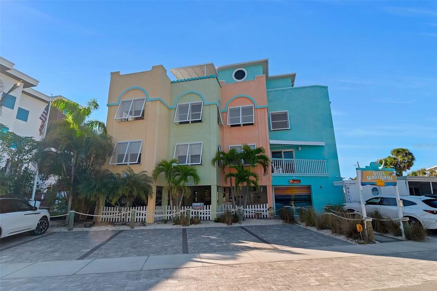 Nightly rentals, a unicorn. This 7-unit investment property is unique in that it operates more similar to hotel than a single family vacation rental. It has years of returning guests and it's one of very few elevated properties allowing the former mentioned, nightly rentals. 2-studios, 2-1 bedrooms, 2-2 bedrooms, and a penthouse suite with wrap around balcony. Your guests will enjoy a great pool area, sizable covered space with a grill, on site laundry, and a roof top deck. It's 1 block to both the Village and beach, guests walk everywhere. Park your car in one of the 7 newly pavered spaces and don't start it again until the vacation is over. Now for you the owner, a private office/guest check in, 2 storage areas for linens housewares etc, and a commercial laundry for turnovers. These types never trade, don't let another 20 years pass before this sells again.