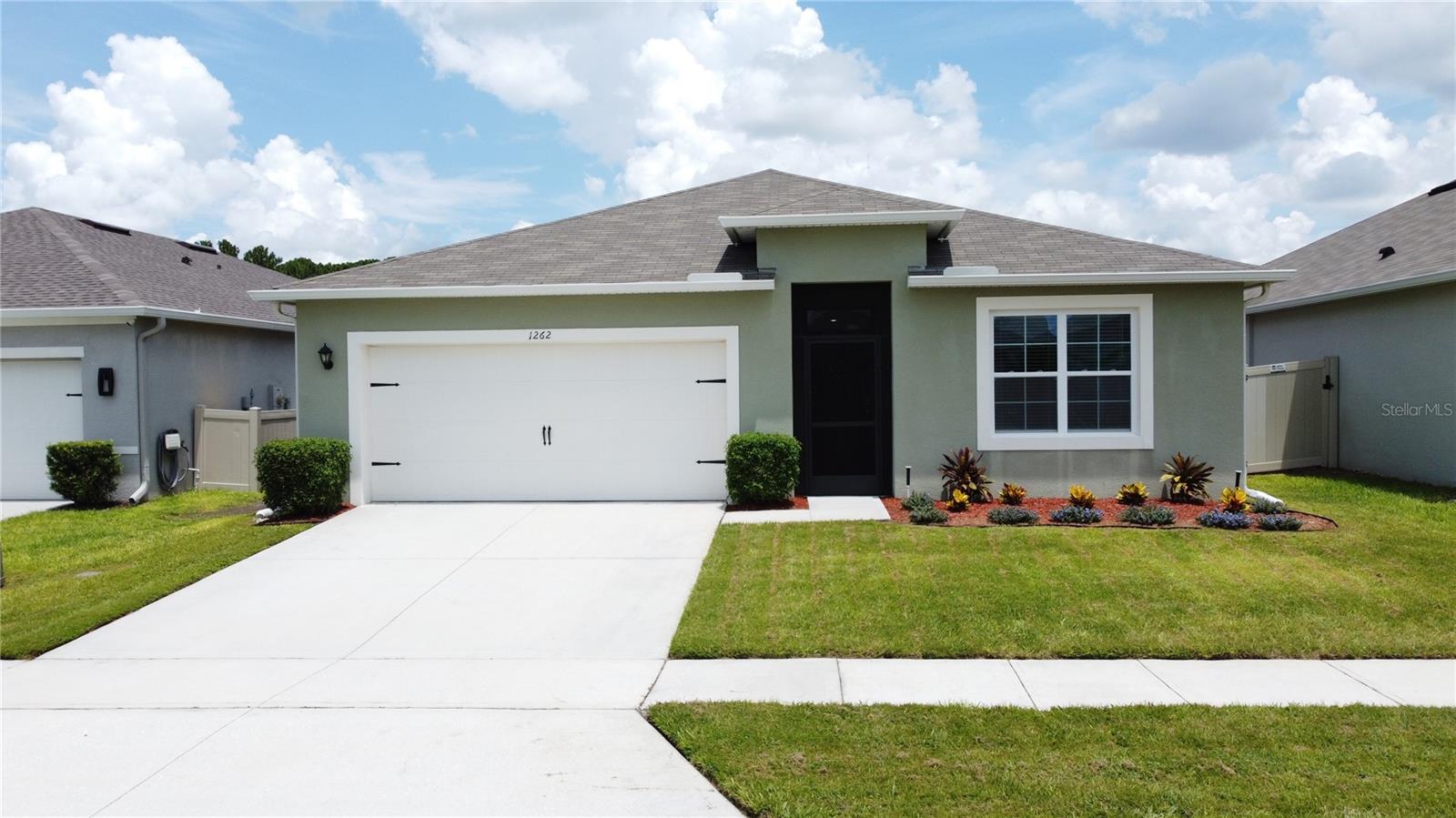 Welcome to 1262 Iguana Loop, where relaxed Florida living meets thoughtful upgrades and an unbeatable location. Tucked away on a great lot just steps from the community pool, this beautifully maintained 4-bedroom, 2-bathroom home is set in the peaceful and highly desirable Meadow Walk neighborhood—bordered by 221 acres of pristine conservation land, with no through traffic and low HOA fees.
Skip the wait for new construction—this home is just four years young and filled with extras that make all the difference. From the screened front entryway that welcomes you in, to the lush landscaping and smart home features that add ease to everyday life, you’ll love the attention to detail throughout. The bright, open floor plan is ideal for entertaining or simply enjoying the Florida lifestyle, with plenty of natural light and modern finishes.
The spacious primary suite offers a peaceful retreat with a generous walk-in closet and a double-sink vanity, while the additional bedrooms provide flexibility for guests, a home office, or a growing family. Ceiling fans and elegant fixtures have already been installed—so all you need to do is move in and enjoy.
Perfectly located just minutes from ChampionsGate, with easy access to golf courses, dining, shopping, a brand-new Publix, medical facilities, and of course, Walt Disney World only 12 miles away—this home offers both everyday convenience and vacation-worthy excitement.
Whether you're looking for a primary residence, a second home, or investment property, this one checks all the boxes.