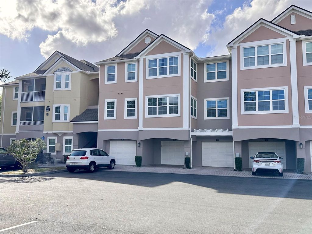 Photo of 6413 Astor Village Avenue #203, Orlando, FL 32835 (MLS # O6402967)