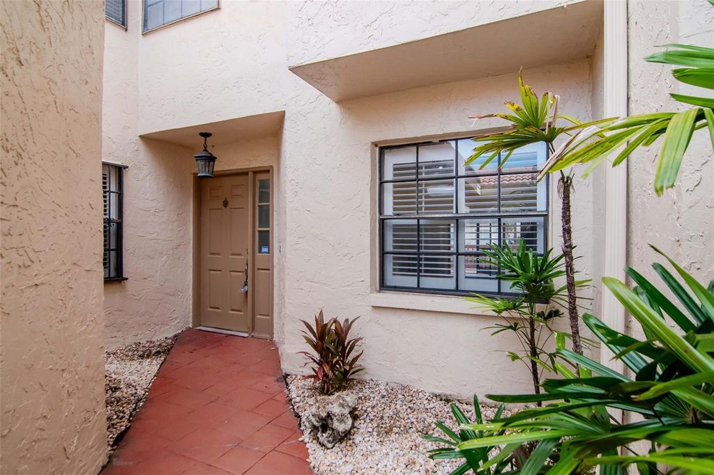 Photo of 10417 Saint Tropez Place #103, Tampa, FL 33615 (MLS # TB8438177)