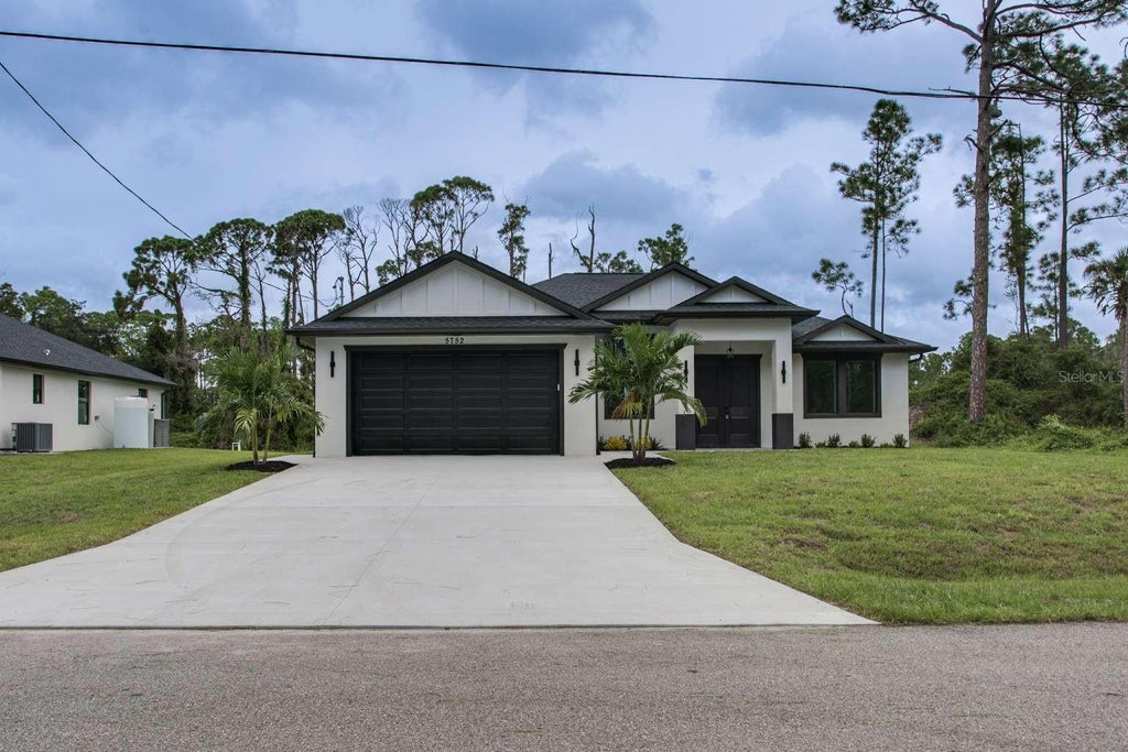 Photo of 5752 Shaffer Avenue, North Port, FL 34291 (MLS # TB8555639)