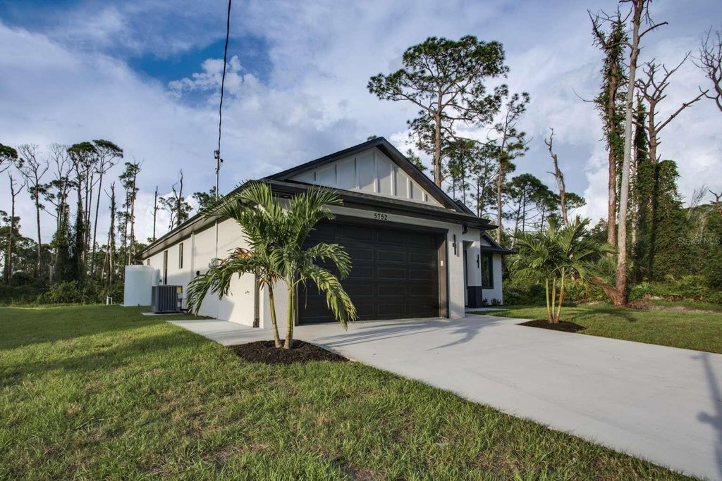 Photo of 5752 Shaffer Avenue, North Port, FL 34291 (MLS # TB8555639)