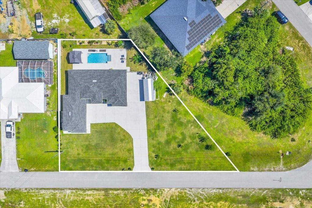 Photo of 363 Paisley Avenue, Lehigh Acres, FL 33974 (MLS # C7516555)