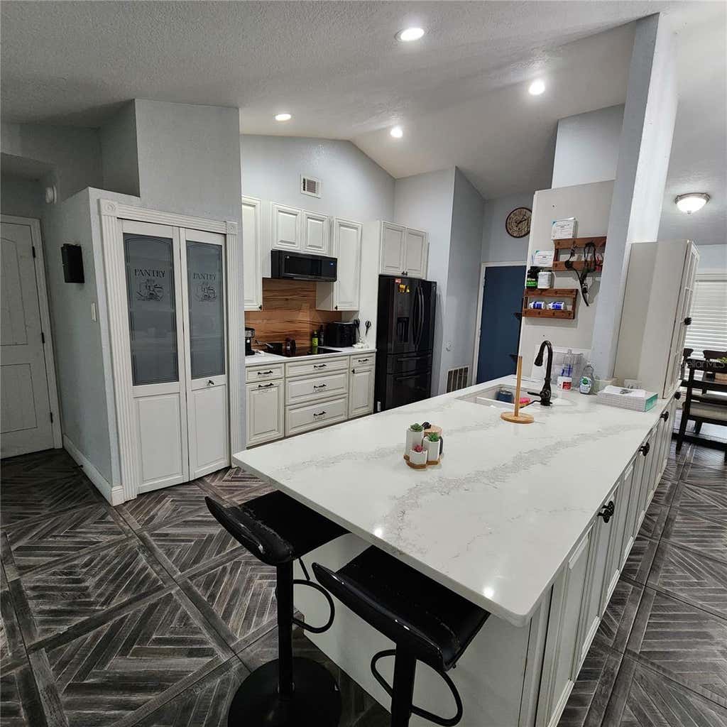 Photo of 2221 Kiwi Trail, Clermont, FL 34714 (MLS # O6435714)