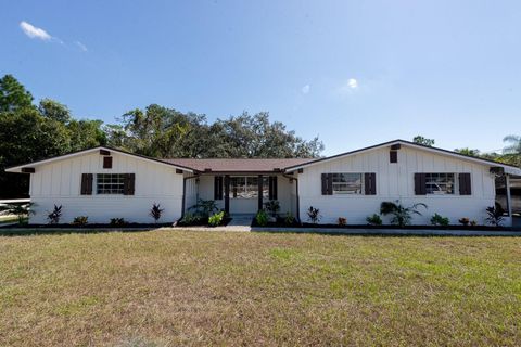 Photo of 9640 Hilltop Drive, New Port Richey, FL 34654 (MLS # TB8440745) Photo of 9640 Hilltop Drive, New Port Richey, FL 34654 (MLS # TB8440745)