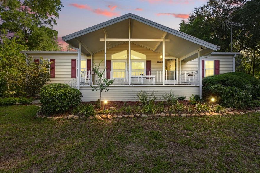 Discover your dream home with this exquisite 3-bedroom, 2-bathroom residence. The property features a split floor plan where the spacious kitchen flows seamlessly into the living area and includes all-wood cabinets that offer abundant storage—ideal for culinary enthusiasts., new stove. Outside, you will find a beautifully landscaped yard that is partially fenced, providing a private oasis. There is also a dedicated play area suitable for children or pets, along with a substantial workshop measuring approximately 52 L ;x 24.5 ft W. app 20 ft ceilings including a sky light, 2 garage barn doors perfect for various projects, RV, boat storage, or as a personal retreat. The workshop was provided and built by Morton buildings on site ( heavy construction). The property is equipped with RV hookups offering both 30-amp and separate 50-amp service, and an outdoor shower with on-demand hot water capabilities. Paved roads with streets lights. Additionally, you can enjoy a formal living room or unwind in the family room or relax on the breezy front porch, The home has a newer metal roof with whole house gutters with gutter guard. . There is a large shed in backyard adds to additional storage. Partially furnished or can be removed. All Conveniently located just minutes from the boat ramp and park, and close to amenities in a quiet, established neighborhood, this home offers significant appeal. Paved roads, Street light, City utilities. It is situated only 30 minutes from Gainesville or Cedar Key, and natural springs are just a short drive away. The area provides numerous activities including scuba diving, hunting, fishing, kayaking, boating, four-wheeling, picnicking, and much more Ready to give it a go?