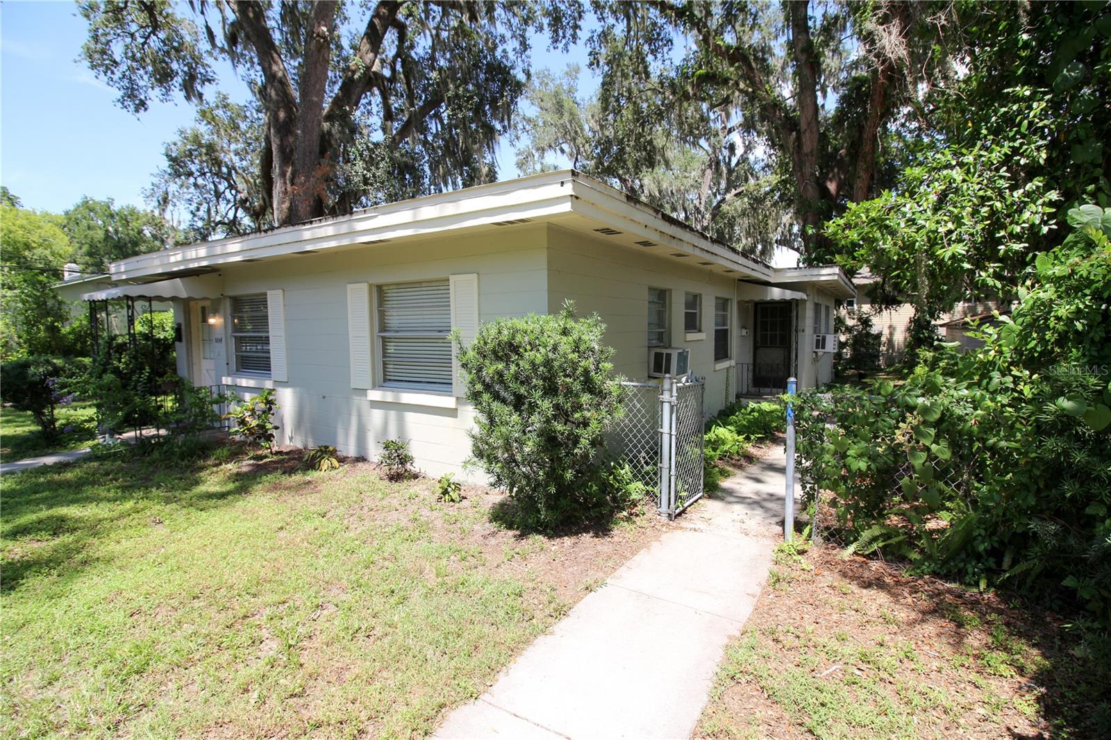 Location, location, location! 2 bedroom 1 bath Duplex in Dixieland. Just one block from South Florida Ave. with shopping and dining options and 1/2 mile from all of downtown Lakeland. This back unit of a front to back duplex features all new wood look ceramic tile and fresh paint. Has an enclosed back patio with full laundry hook ups and a covered wood porch. Two dedicated parking spots and a backyard with a large oak tree. Sorry No Pets!