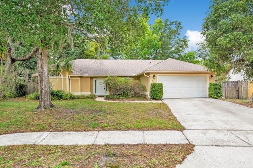 Welcome to 1030 Long Branch Lane, a well-maintained one-story home on a quarter-acre lot in the highly sought-after Twin Rivers community of Oviedo. This home offers a great layout with cathedral ceilings, plenty of natural light, and a comfortable flow that works for both everyday living and entertaining. Inside, you’ll find a spacious main living area that connects seamlessly to the dining space and kitchen, creating an open, inviting feel. The kitchen overlooks the living areas, making it ideal for staying connected while cooking or hosting. The split floor plan offers privacy, with a generously sized primary suite and well-proportioned secondary bedrooms. Large windows and French doors bring in natural light and enhance the home’s bright, airy feel, while the layout offers flexibility for a home office, guest space, or growing household. The owners have taken care of the big-ticket items for you, including energy-efficient windows and French doors (2019), electrical panel (2019), gutters (2021), HVAC (2022), water heater (2022), roof (2022), and a full home re-pipe with PEX plumbing (2024). You’ll also find custom built-in bookcases (2025) that add a nice touch to the living space. Out back, the large backyard with no rear neighbors is a private sanctuary ready for any setup, whether that’s a patio, fire pit, or future pool, with space to truly make it your own. Location is where this one really stands out. Zoned for top-rated Seminole County schools: Carillon Elementary, Lawton Chiles Middle, and Hagerty High, and just minutes to Oviedo on the Park, Twin Rivers Golf Club, UCF, and Research Park. You’re also 10–15 minutes to major highways, making it an easy drive to Downtown Orlando, the airport, and all the attractions. Low HOA, move-in ready, and in one of Oviedo’s most established communities, this is a solid opportunity in today’s market.