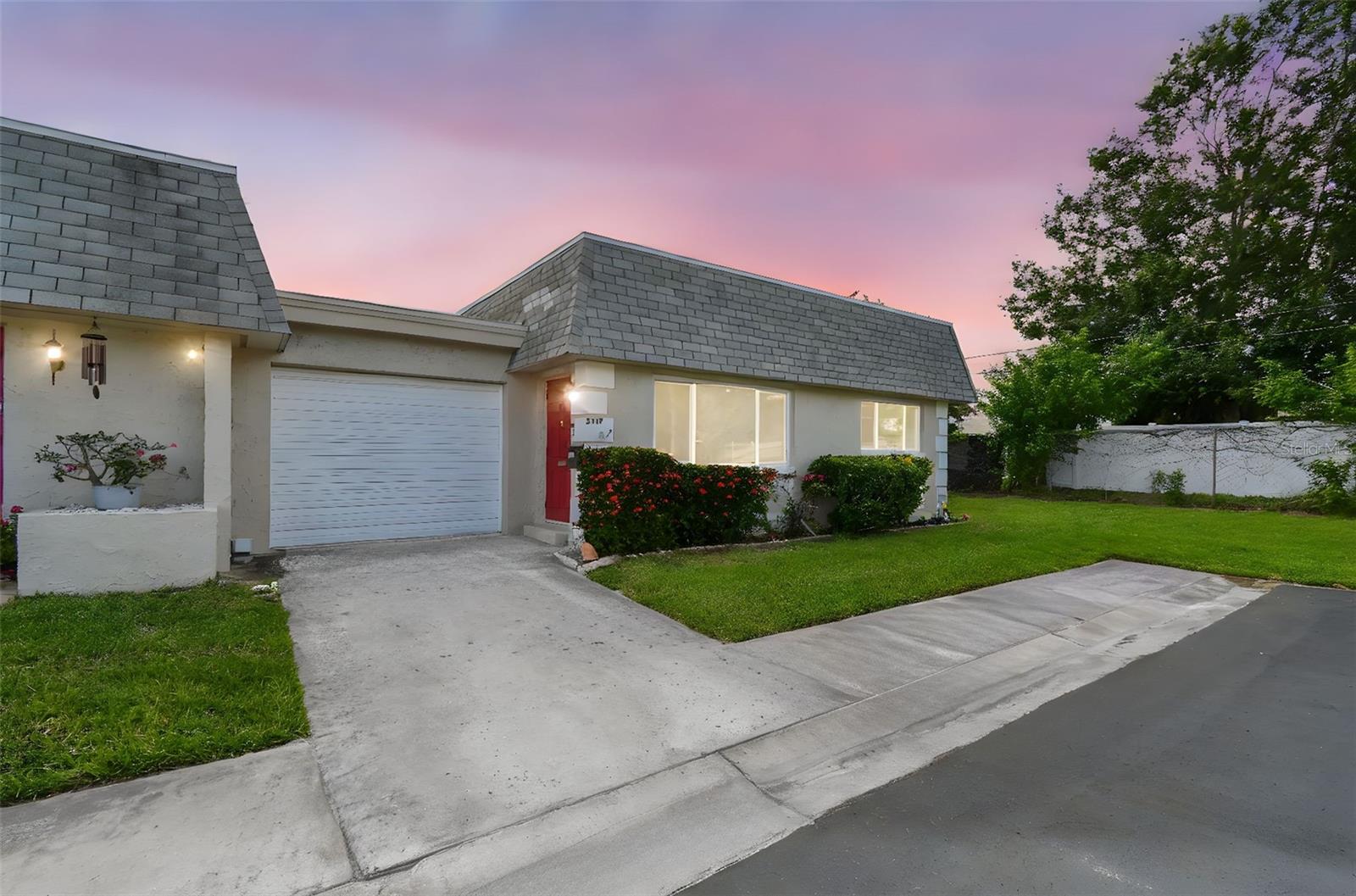 Welcome to 8447 Orleans, a charming 2-bedroom, 2-bathroom villa nestled at the end of the street for added privacy. This lovely corner unit in the highly sought-after 55+ community of Vendome Village in Pinellas Park, Florida, offers a bright and welcoming layout with abundant natural light streaming through large UPDATED windows. The home features a spacious living area, a beautiful kitchen complete with stainless steel appliances, and a seamless flow perfect for everyday comfort or entertaining guests. The primary suite offers a walk-in closet with ample space and an ensuite bathroom with a step in shower. The second bedroom is perfect for guests or a cozy home office and the guest bath offers a tub as an alternative option. A one-car attached garage provides convenient and secure parking, along with additional storage options and washer & dryer connections.
Built with solid block construction, this well-maintained residence exudes classic Florida charm in a peaceful and neighborly setting. As part of the Vendome Village community, residents enjoy access to a sparkling pool, clubhouse, shuffleboard courts, and a calendar full of social events and activities. The HOA takes care of many essentials including lawn maintenance, cable TV, sewer, water, and trash, allowing you to enjoy a carefree lifestyle.
Ideally located in central Pinellas County, this home is just minutes from top-rated Gulf Coast beaches, shopping centers like Target, Publix, and Walmart, as well as numerous dining options and healthcare facilities. Easy access to major places for you to enjoy and only 15 minutes from downtown St. Petersburg and 30 minutes from Tampa International Airport.
8447 Orleans Avenue is more than just a home—it's a lifestyle. Whether you're looking to relax poolside, stay active in community events, or explore all that the Tampa Bay area has to offer, this light-filled villa provides the perfect blend of comfort, convenience, and community. Don’t miss your chance to experience the best of 55+ living—schedule your private showing today. Monthly HOA dues of $729.47 include both, HOA dues and monthly land lease dues.