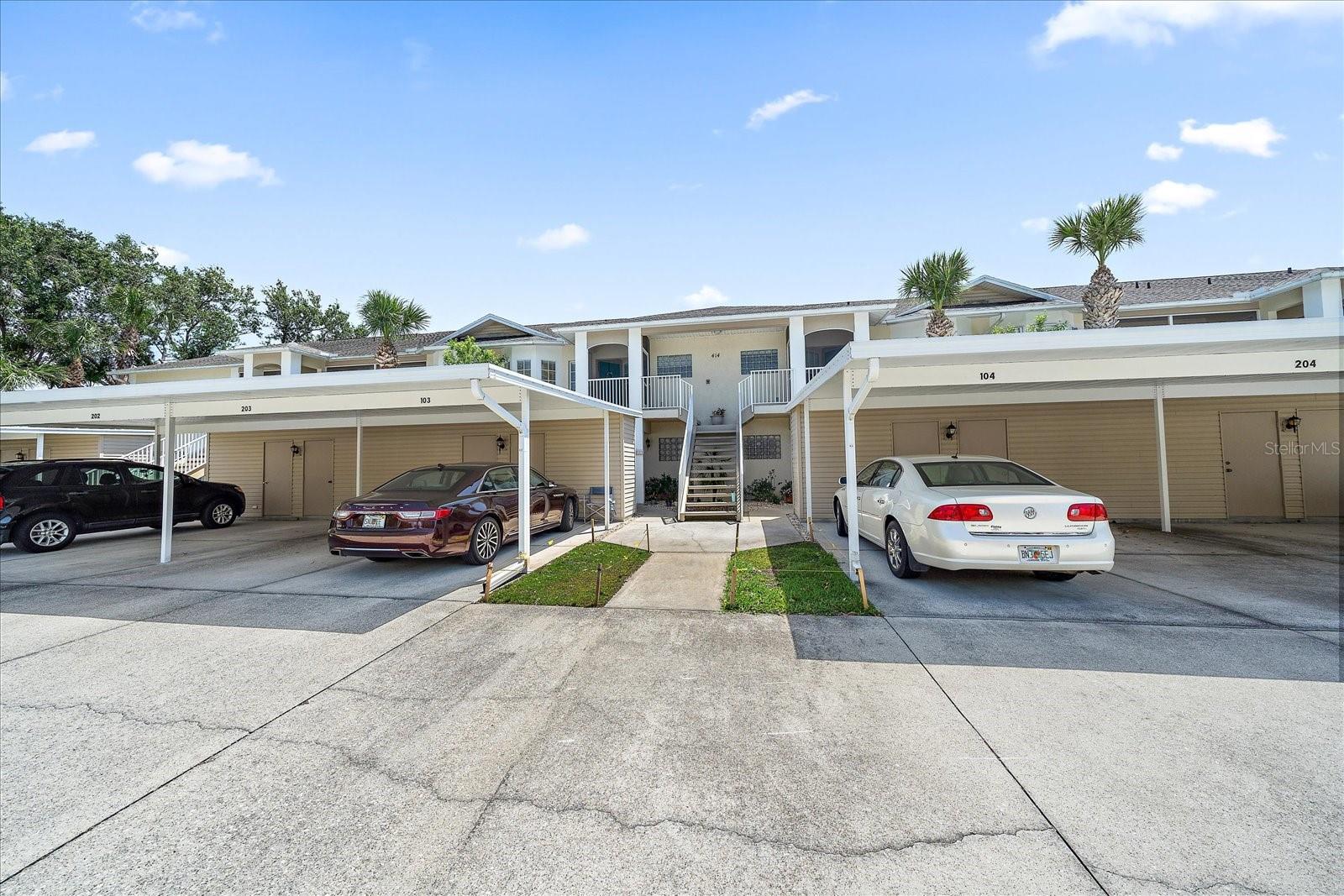 Reduced and move in ready! Enjoy serene lake views from this well-maintained second-floor condo! This home featuring an open floor plan and high vaulted ceilings that create a spacious ambiance. This 2/2 unit includes a den/office and a beautiful enclosed lanai, perfect for relaxation. The kitchen is equipped with granite countertops, ample storage, and a cozy nook. The spacious master suite boasts a large walk-in closet, while the private second bedroom includes its own bath for added convenience. The condo boasts plenty of extra storage solutions, including: a coat closet near the entrance, a linen closet for organized storage of towels and bedding, and the pantry for keeping kitchen essentials. Newer vinyl plank flooring. Additional features include private parking, an extra storage closet, and access to the vibrant Waterside Village community, which offers a clubhouse, three pools, tennis courts, bocce ball, shuffleboard, pickleball, and organized activities. This property is just minutes away from beaches and shopping, with easy access to I75. This is a must see!