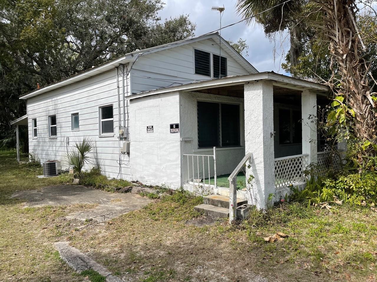 Built circa 1928, this 2/1 has a 12 x 32 loft that could be finished for extra living area or another bedroom. Zoned residential--R5--, the highest and best use is potentially for multifamily purposes as the lot is 238 ft deep and the property is located on the corner of SR 44 and Park Blvd. ;Water: City