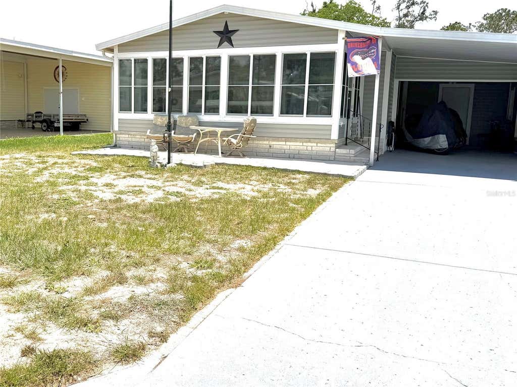 Photo of 12176 Evantide Avenue, Brooksville, FL 34613 (MLS # W7886350)