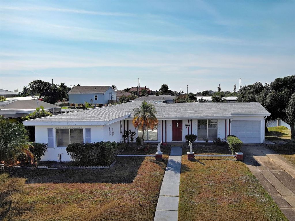 Photo of 534 Lindley Terrace, Port Charlotte, FL 33952 (MLS # D6145116)