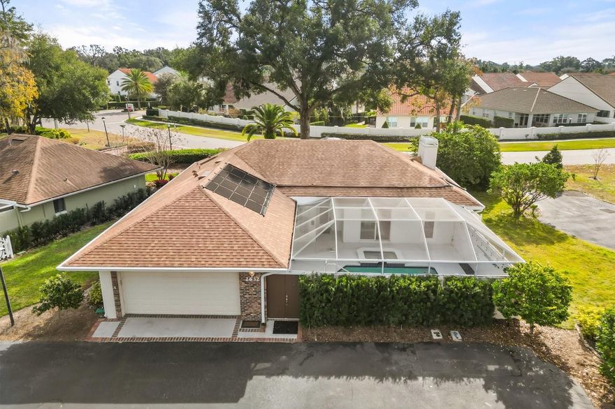 Move-in ready patio-style pool home in wonderful Sweetwater Country Club! This is the best value in the community. Recently refreshed with fresh paint, updated lighting, fixtures, and new carpet in the primary. Walled courtyard pool area located at the entrance of the home offers an abundance of privacy! The comfortable floor plan includes a large great room with a wood burning fireplace and enclosed/screened porch off the back. The kitchen features updated appliances, including an induction cooktop (cookware included!), as well as a large pantry. The primary offers crown molding, plantation shutters and a spacious private bath with a large walk-in shower. The secondary bedroom also has crown molding and plantation shutters as well as a large walk-in closet. The third bedroom includes handsome wainscoting on the walls. One unique feature this home includes is a large 14x8 interior workshop with tons of cabinets, ample counter space and a large storage closet, which is every do-it-your-selfer's dream! Whole house GENERATOR included. Some updates may be desired, but super clean and a great value in a beautiful community! Trane HVAC is 6 years old. Roof was replaced October of 2015. Fabulous location close to a plethora of dining and shopping. Community is located directly across the street from Wekiwa Springs State Park.