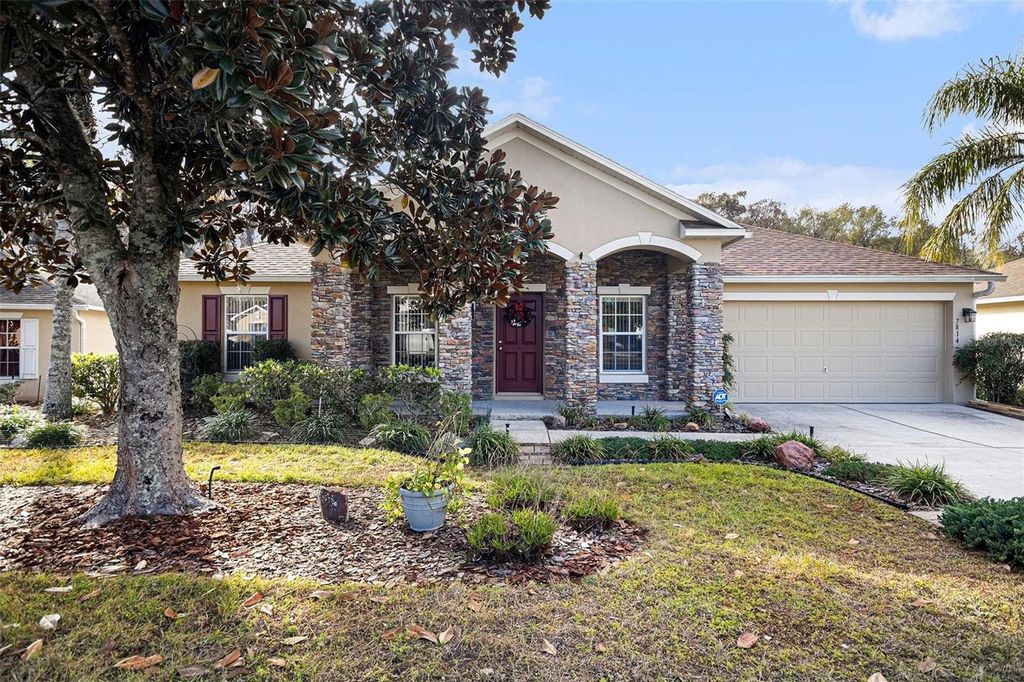 Photo of 7814 Sloewood Drive, Leesburg, FL 34748 (MLS # O6373868)