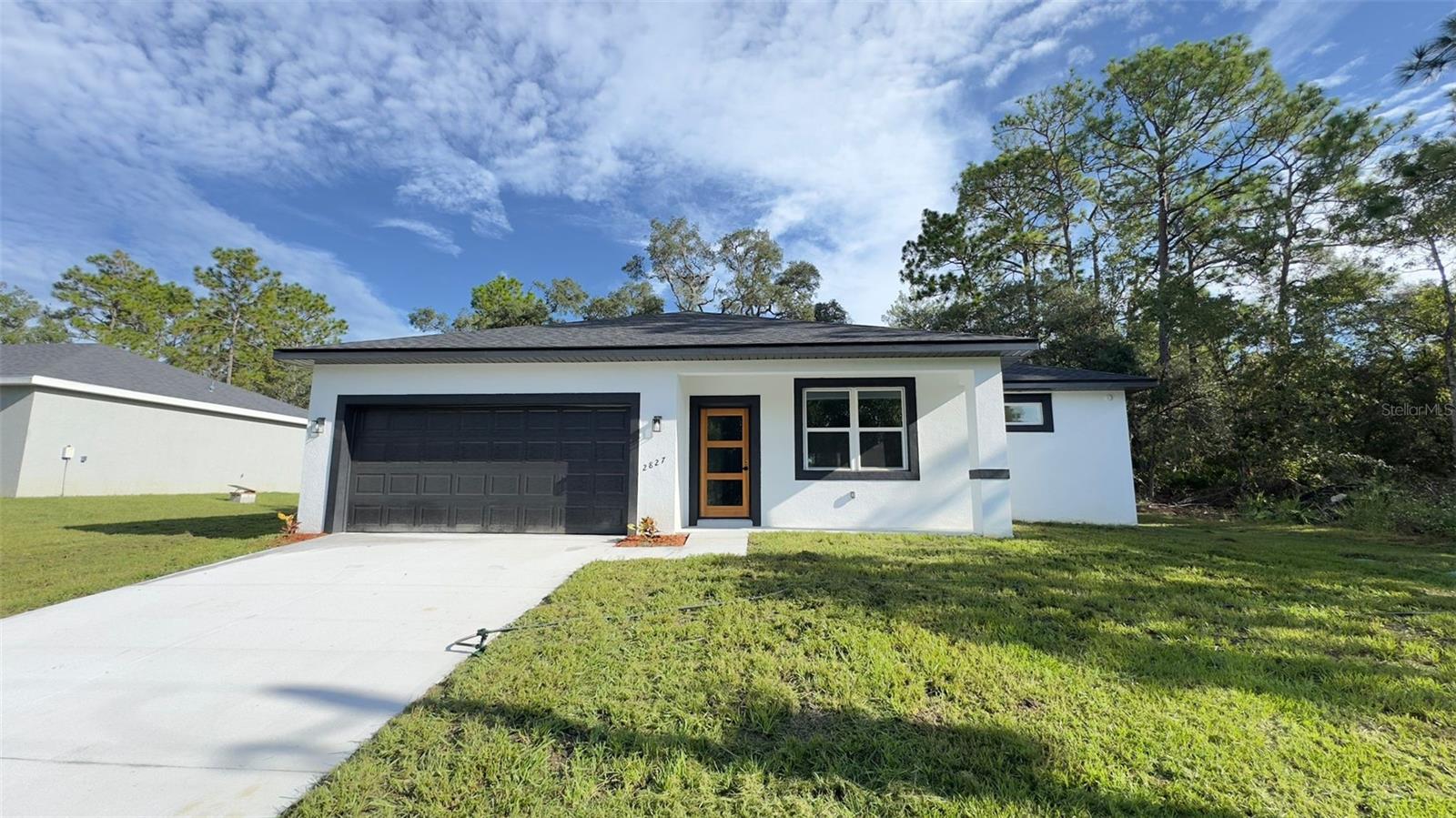 Move-In Ready – Your Florida Dream Home Awaits! This is not a property under construction – it’s fully completed and ready for you to move in today! Plus, the seller is offering closing cost assistance. Enjoy 1,548 sq. ft. of pure comfort and style, featuring 4 spacious bedrooms and 2 modern bathrooms, all thoughtfully designed to combine elegance, functionality, and practicality. Step inside to a bright, open living area seamlessly connected to the stunning kitchen – the perfect setup for both entertaining and everyday living. The kitchen stands out with stainless steel appliances, ample cabinet space, and a practical breakfast bar ideal for quick meals or casual gatherings. The dining area, perfectly positioned next to the kitchen, offers the ideal setting for formal dinners or cozy family meals. The open-concept layout creates a natural flow filled with abundant natural light, making every moment at home feel warm and inviting. Prime location in a high-demand, fast-growing area. Home Highlights: 100% move-in ready – no waiting on construction, Modern design with fully integrated living spaces, Seller offering closing cost assistance, Spacious, light-filled rooms, Ideal layout for relaxation and entertainment. Don’t miss this opportunity!