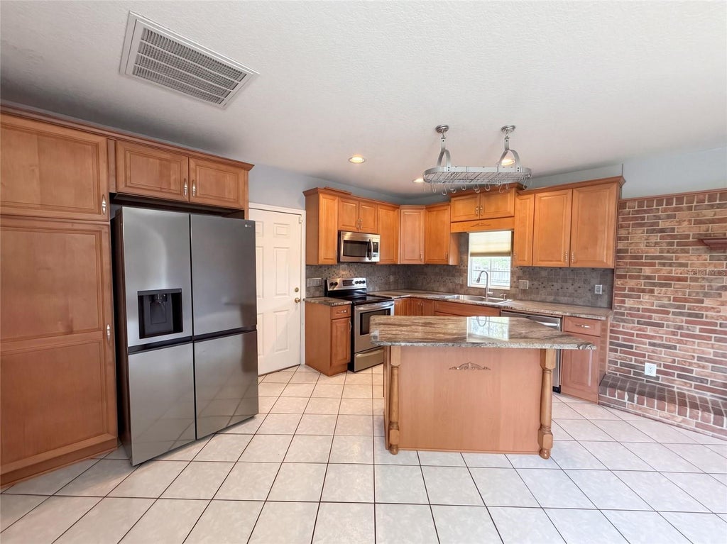 Photo of 1881 Old Daytona Road, Deland, FL 32724 (MLS # O6444284)