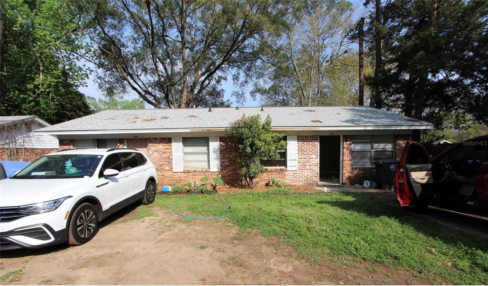 Charming brick duplex in the heart of Tallahassee! This 4-bedroom, 1,362 sq ft property offers excellent rental income potential with two units under one roof. Currently tenant-occupied, each unit rents for $1,000/month, generating $2,000/month in total rental income. Situated on a 0.19-acre lot, the home features a spacious layout, ample natural light, and off-street parking. Conveniently located near downtown, shopping, and Florida A&M University, this property is a great opportunity for investors or owner-occupants looking to offset their mortgage with rental income.