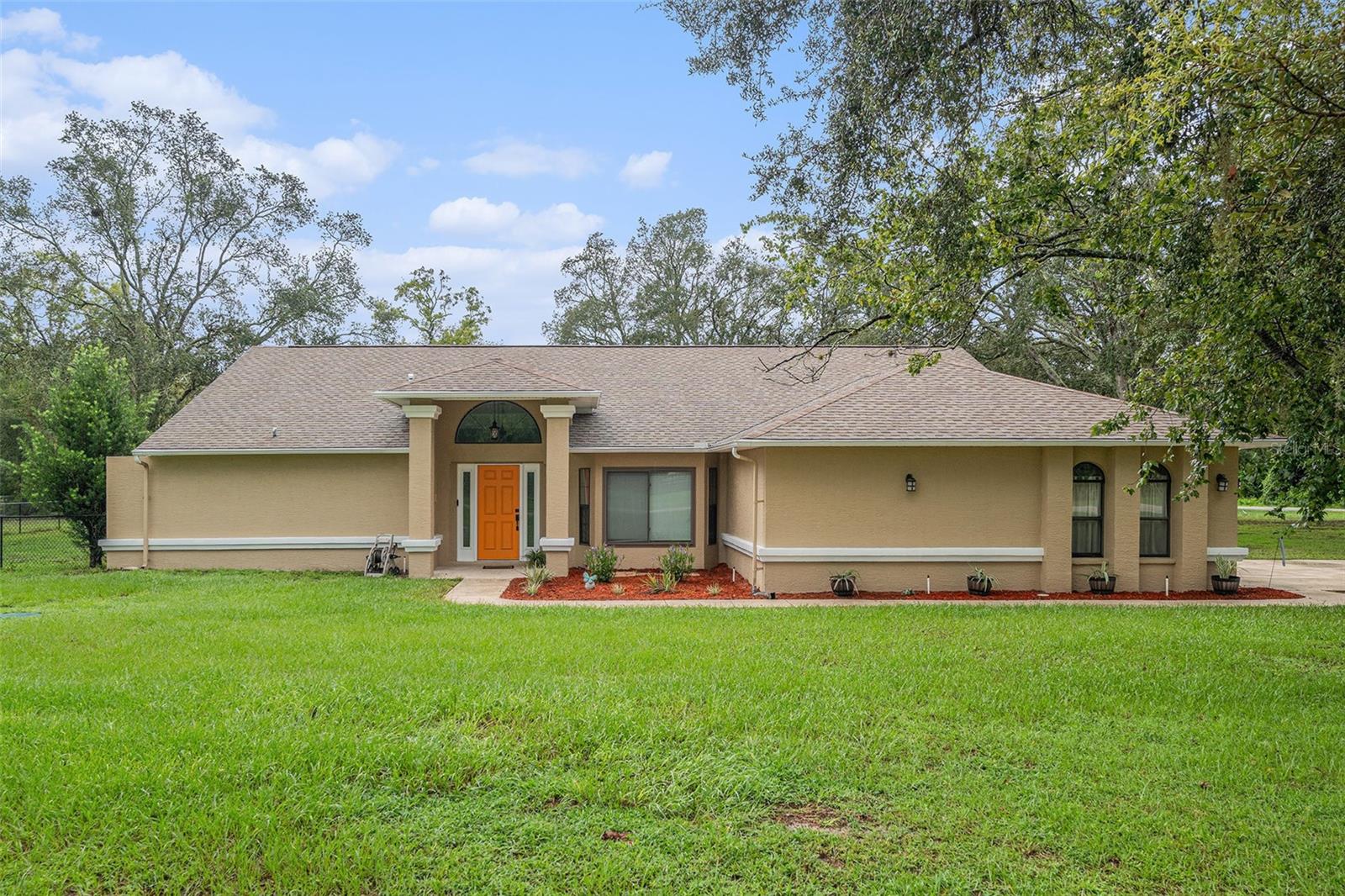 Enjoy a peaceful country living at 18212 Hoot Owl Ln! This charming home sits on a fenced-in spacious, 1 acre lot on a non-throughout Cul-De-Sac with no HOA or CDD- perfect for outdoor toys, animals, gardening, and everything in between! Outside, the home has recently been painted and comes included with LeafFilter Gutter Guards for easy maintenance!
Step inside your forever home to a new HVAC (2024), water heater (2024), new paint, remastered kitchen and master bath, comfortable living spaces, and an open floor plan. Out back is your personal oasis with a large birdcage, Diamond Brite resurfaced pool, and hot tub.
The rear of the lot includes a 3000 sq ft barn with bay doors and new HVAC (2024), electrical, and plumbed. Perfect for boats, RV’s, a workshop, or 2nd dwelling. The barn roof includes a lifetime warranty on the Gaco elastomeric coating.
Conveniently located near major roads, shopping, and nature preserves. You don't want to miss this opportunity to own a slice of quiet Florida living!