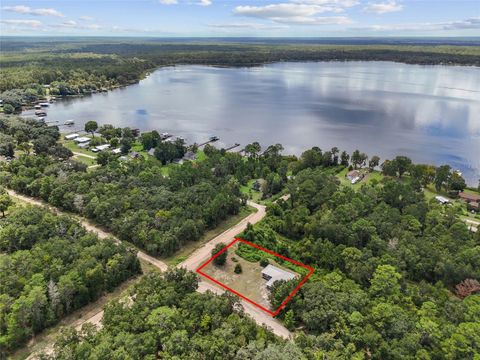 Photo of 127 Rainbow Drive, Florahome, FL 32140 (MLS # GC533857)