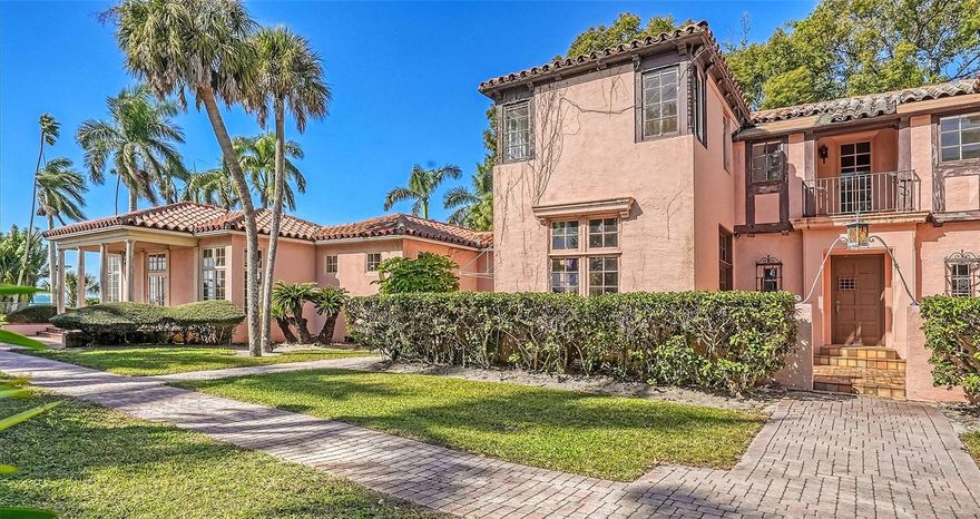 Sited on 1.1 acres of direct Bay Front where Sarasota Bay is its widest provides shockingly beautiful open water views along with priceless sunsets for this classic two-story Mediterranean Revival residence. The gated estate is set back from the point where Bay Shore Road curves at Ainsley Place and is called The Etowah named for the Etowah River in north Georgia. The 5,812 sq. ft home will require a major renovation to  the original structure and the large extension added to the west of the home in 1992 by local architect Frank Folsom Smith. The historic portion of the home still has an amalgam of well-proportioned rooms, its original light sconces, wood floors, and beautiful arch details. The entry features a vaulted ceiling which leads to the living room centered on a beautiful fireplace as a focal point. The sunroom is surrounded in with windows of original circus glass. The dining room is on scale for entertaining. The adjacent kitchen is privy to an old fashioned back staircase leading to the second level. The 2nd level features the original owner’s bedroom claiming front and center position onto the view with 3 other bedrooms on this level. In the added wing, an oversized Great Room, an auxiliary kitchen and large owner’s quarters with a walk-in closet and spacious bath provide open water views. An original garage joins the home with separate 2nd level guest quarters.. The covered boathouse is also historically designated. The home has been unoccupied for a considerable period of time. A serious renovation is required. The list price is considered to represent land value.