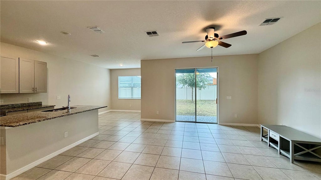 Photo of 1280 Tupelo Trail, Haines City, FL 33844 (MLS # S5158617)
